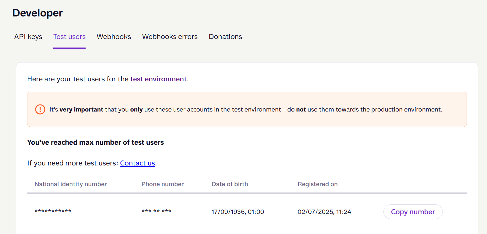 Portal Test users tab showing a test user with auto-generated phone number and NIN